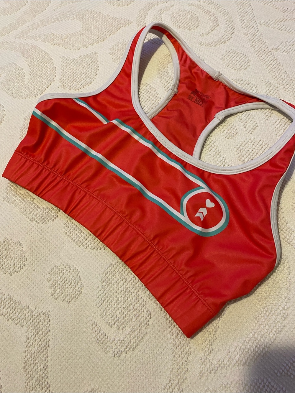 Vibrant Coral Racerback Sports Bra with Contrast Stripe